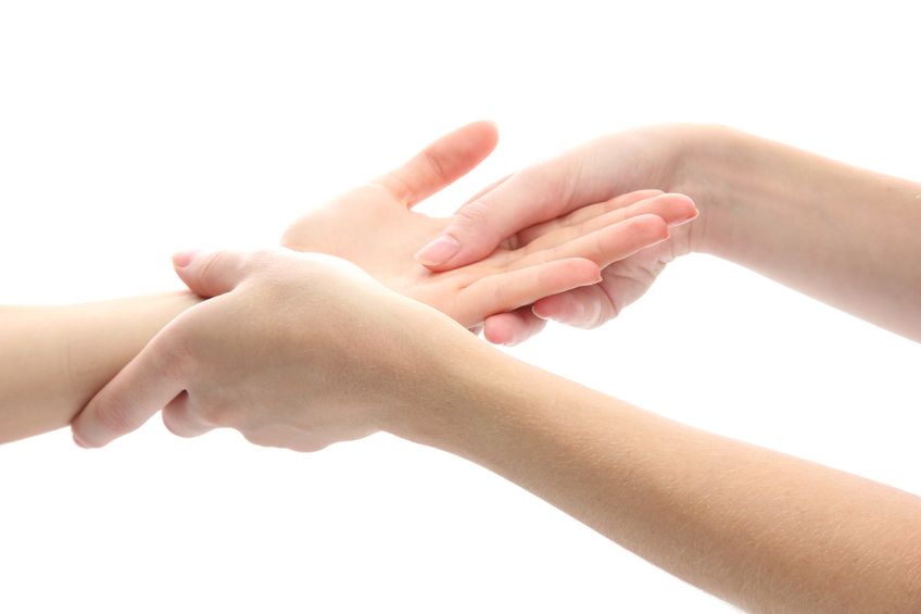 15047879 - hand massage, isolated on white